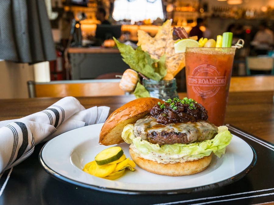 A bloody mary and a cheeseburger look absolutley delicious from Tips Roadside in Kenwood