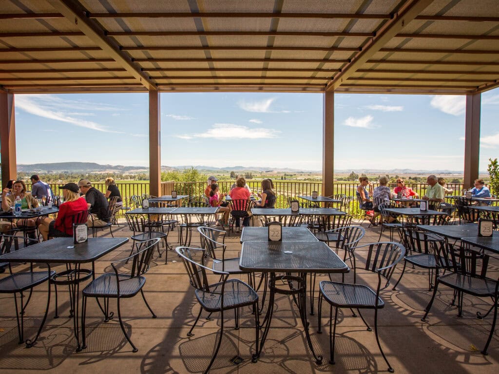 people on the patio at gloria ferrer vineyards