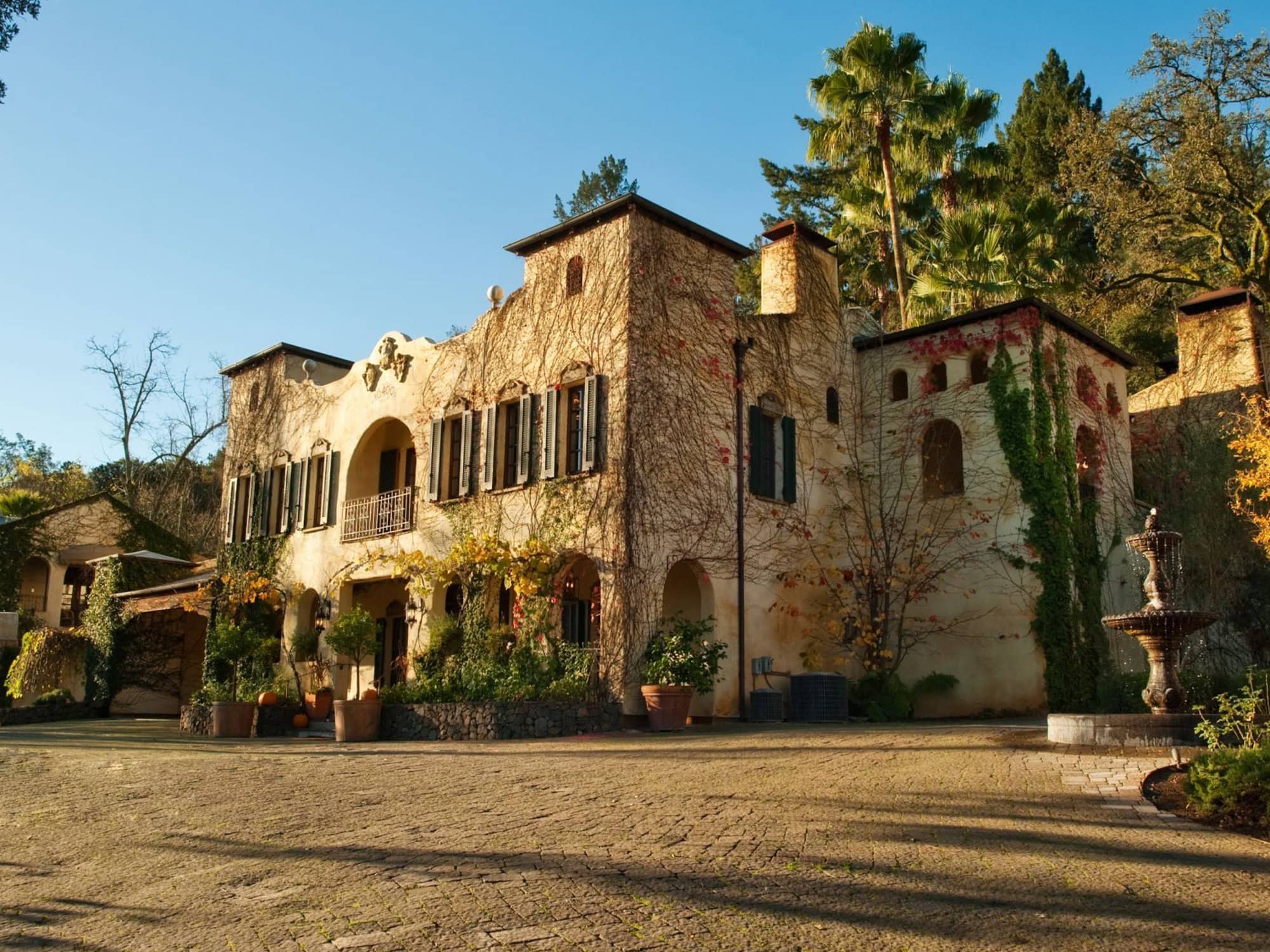 The exterior of the inn is covered in ivy