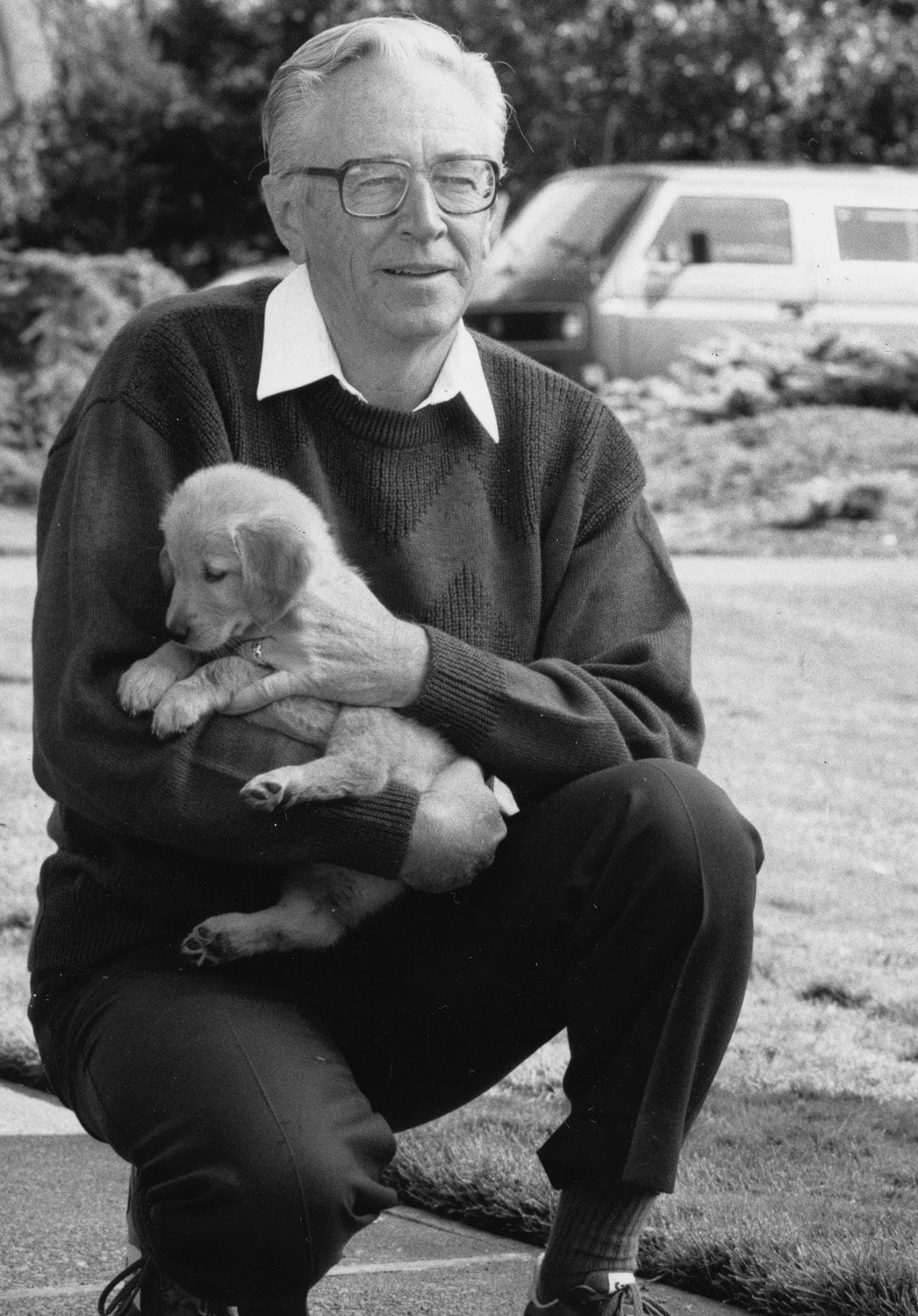 Charles Schulz with dog.