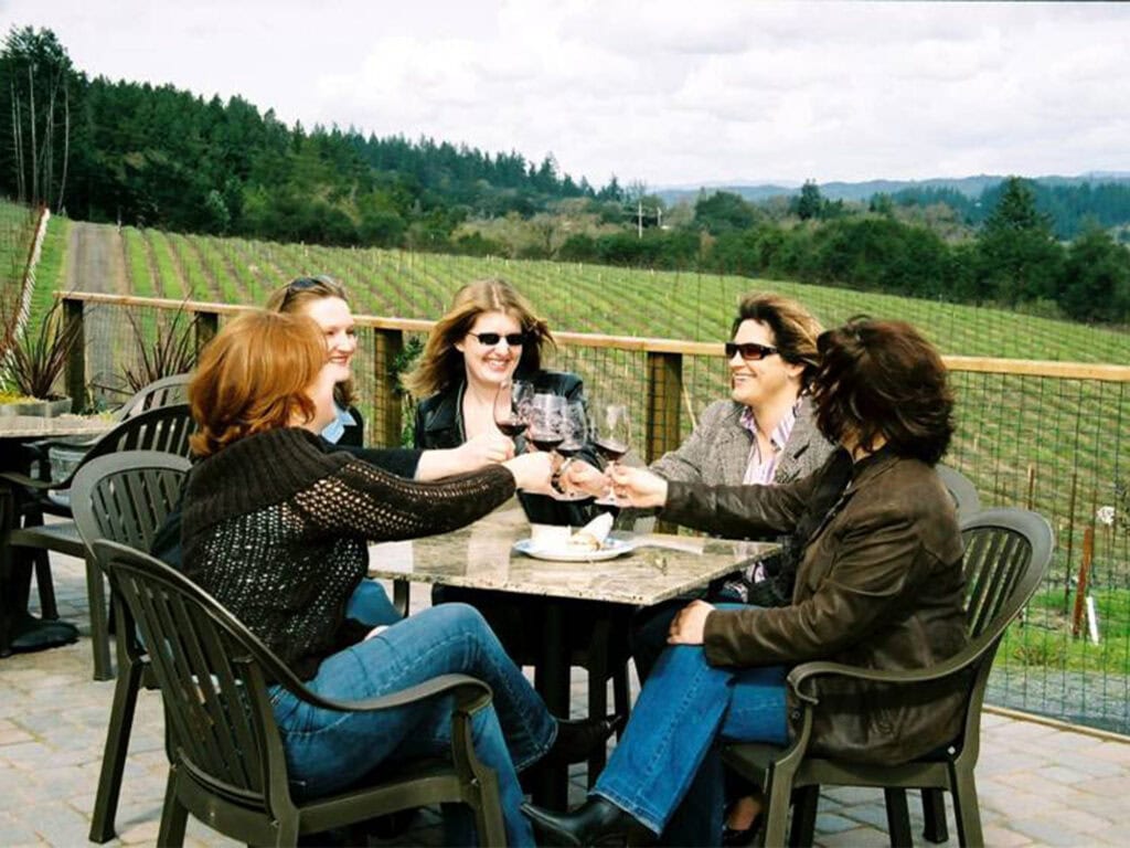 Group of people enjoying at wine tasting at the winter wineland event in Sonoma County