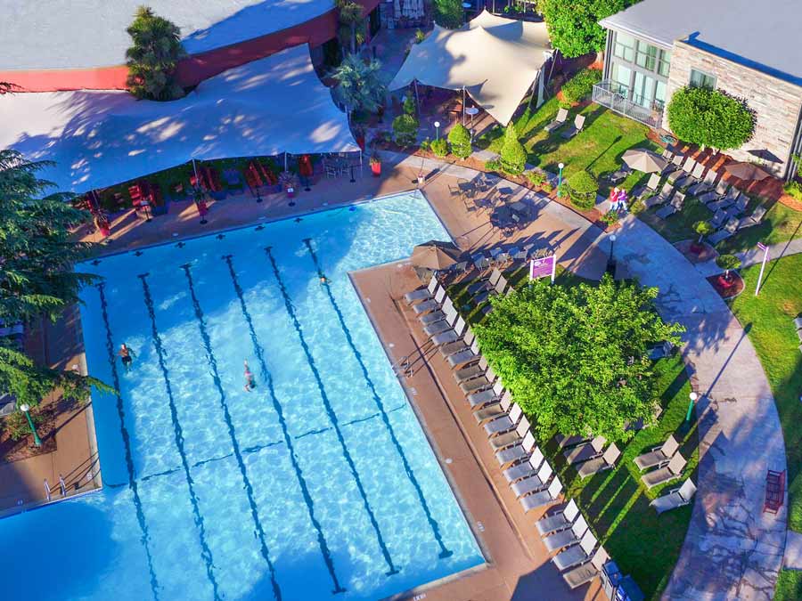 The pool at the Flamingo Resort from above on a summer day in Sonoma County