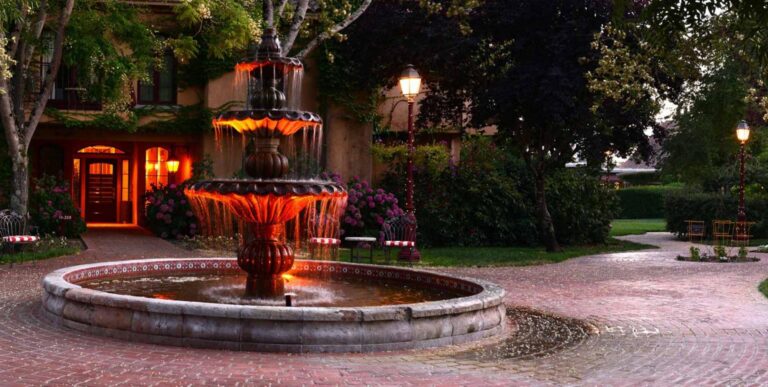 The fountain is illuminated at night at the Vinters Resort, Sonoma County