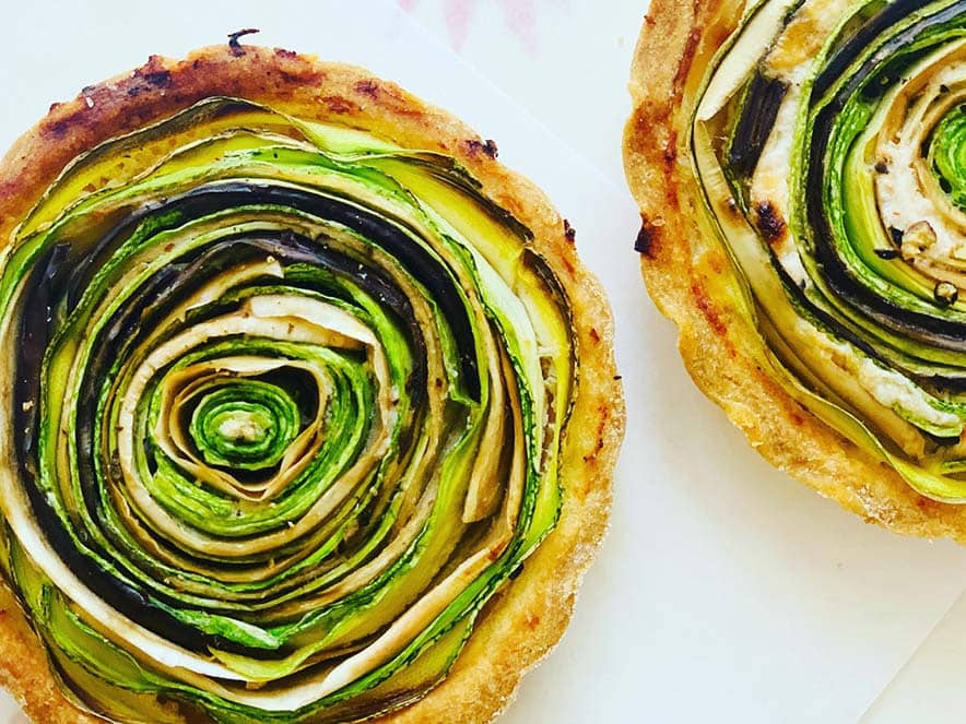 vegetable tarts with green vegetables