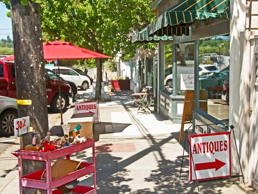 Antiques on display on the sidewalk