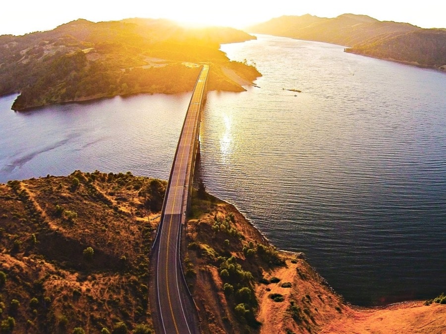 Lake Sonoma and the bridge glisten in the setting sun in Sonoma County