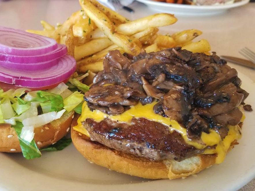 Close up image of a burger at Mike's at the Crossroads in Sonoma County