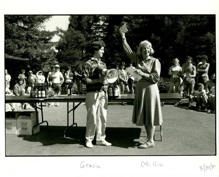 Millie Howie at the “Come Up to Simi” 10K run on Aug. 30, 1981, with Simi’s vice president of public affairs Gracelyn Blackmer (left). The event raised money for the Wine Library and Millie is holding up the check (Photo by Lenny Siegel)