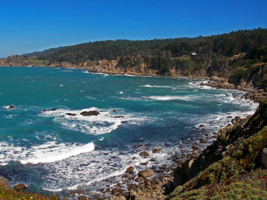 Rocky cove with turquoise Pacific Ocean water at Salt Point State Park 