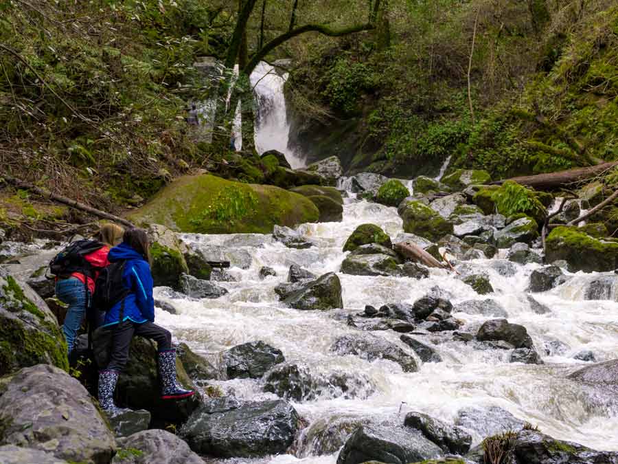 People gaze at the waterfall at Sugarloaf Ridge State Park, Sonoma County