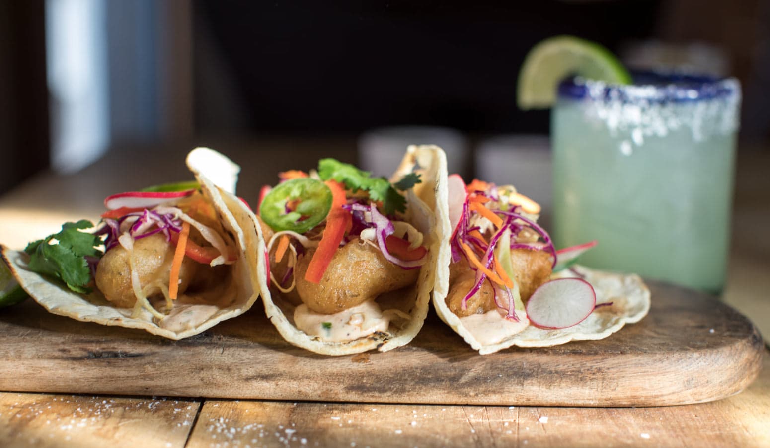 Beer-battered rock cod fish tacos at Rocker Oysterfeller's 