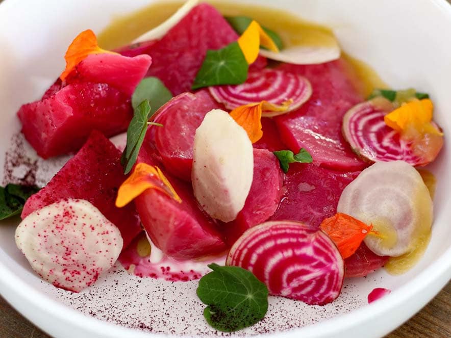 bright pink vegetables on white plate