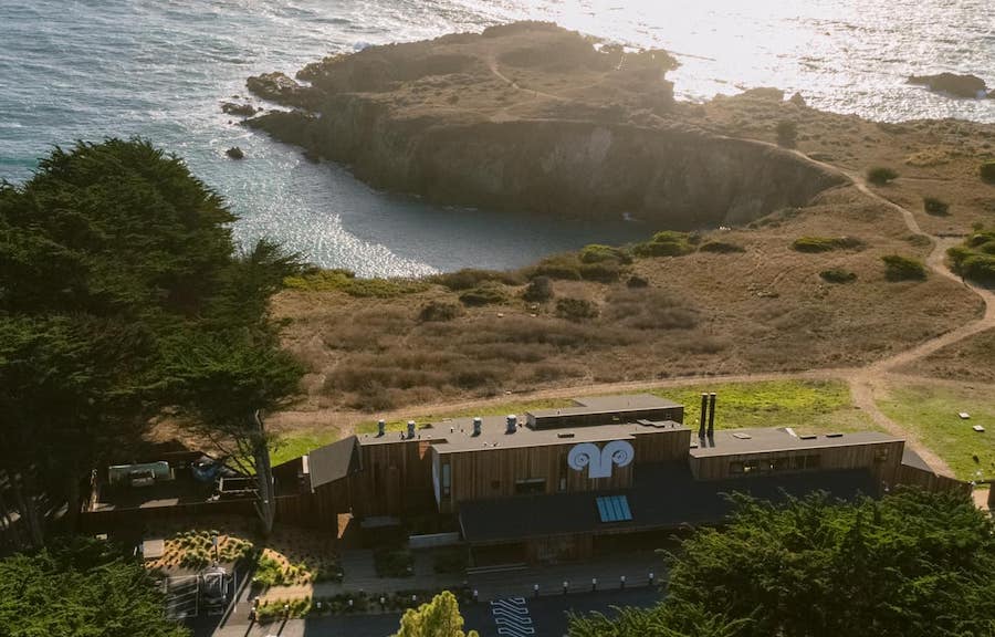 Aerial view of Sea Ranch Lodge, perched beside the Pacific Ocean 