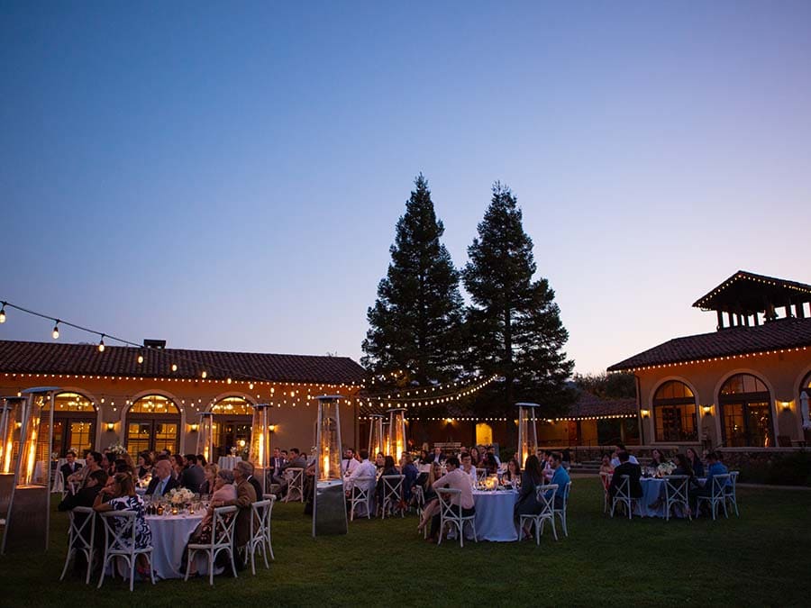 outdoor dining reception with lights