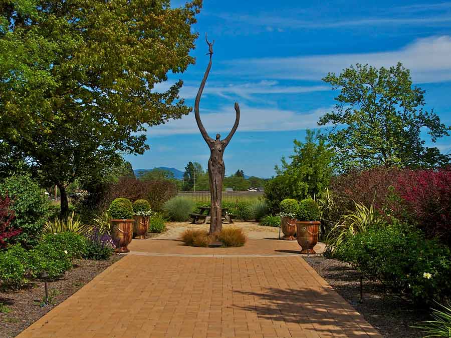 The 18-foot tall bronze statue of Gaia greets visitors to DeLoach Vineyards