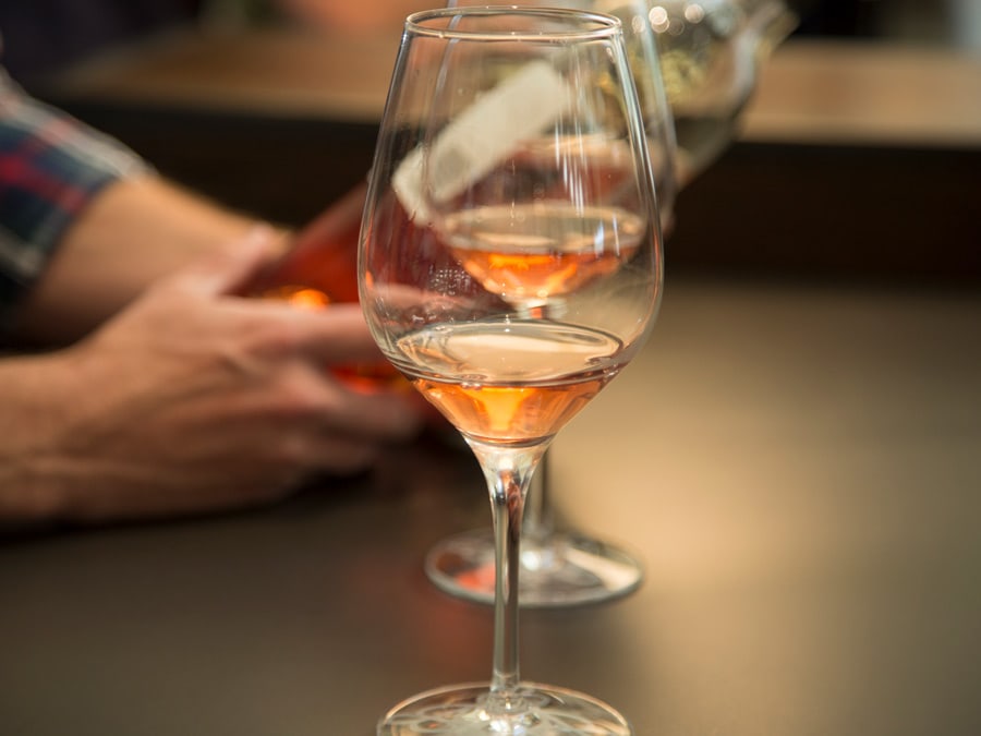 A glass of freshly poured rosé in Sonoma County