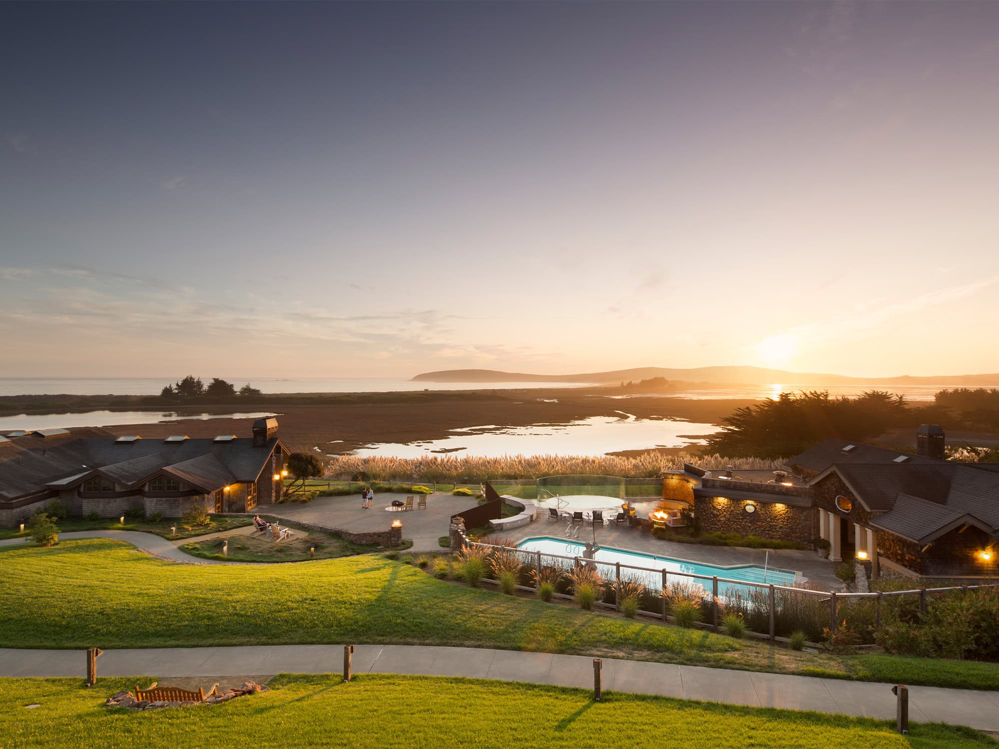 The sunsets over people having a barbeque at Bodega Bay Lodge, Sonoma County