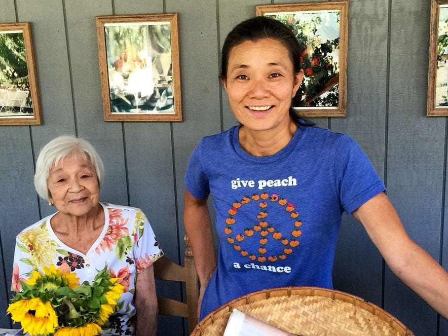 Two women from Dry Creek Peach & Produce.