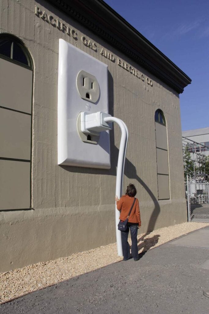 Checking out "Outlet, Plug & Cord," a work of sculpture by fabricator Shawn Thorsson and artist Joel Jones at the First and D Street PG&E substation in Petaluma—Photo by Jim Johnson