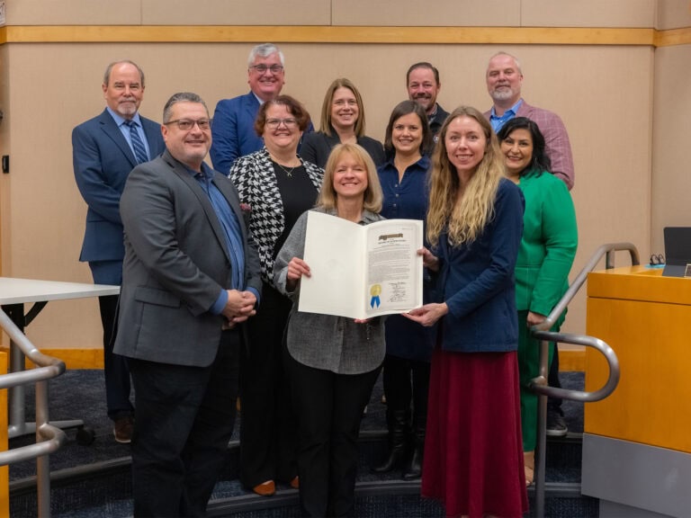 Sonoma County Tourism signing Gold Resolution award