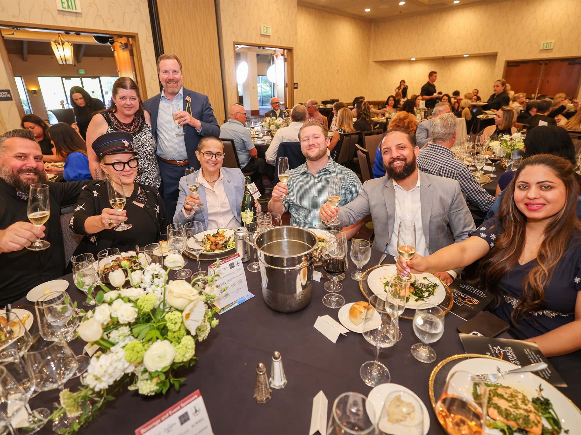 group of hospitality workers cheering at Star of the Industry