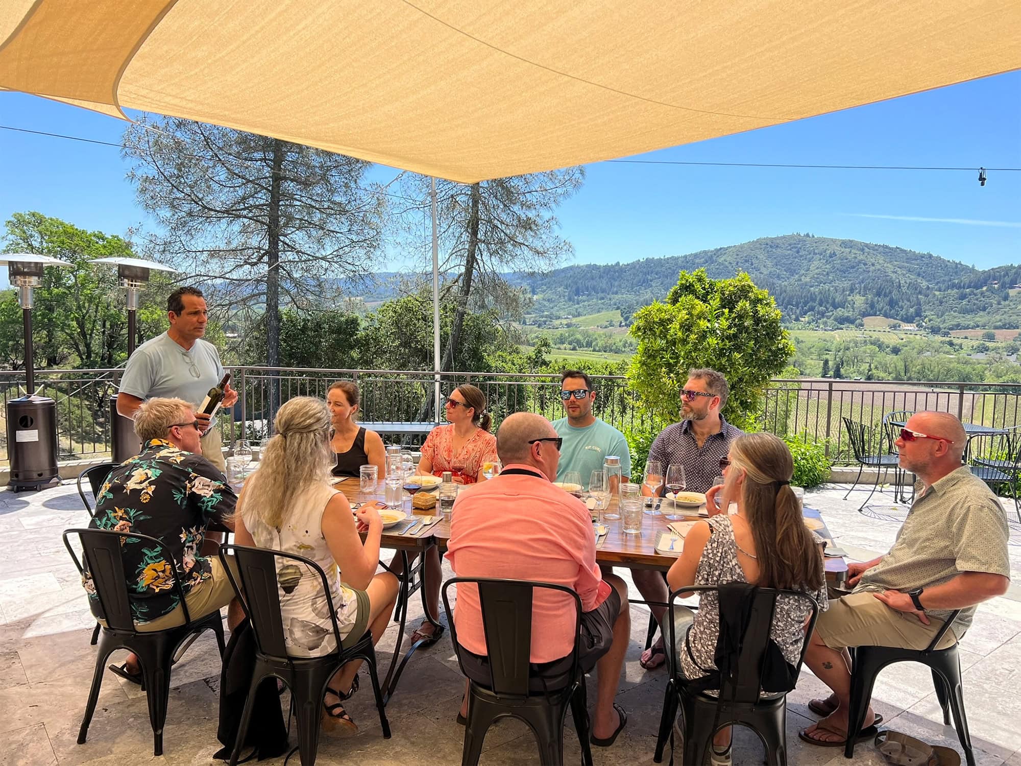 group of people doing a wine tasting in sonoma county